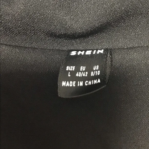 Beautiful black pleated dress… pin not included or the necklace. Size Large - Picture 4 of 4